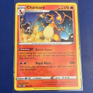 Pokemon Charizard Card with Red and Blue